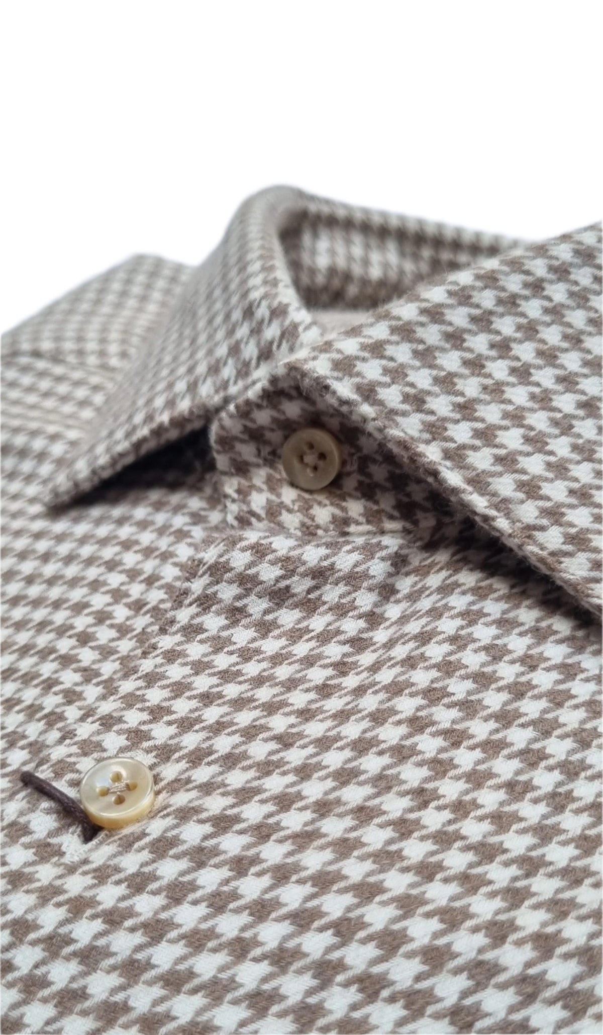 Stenstroms Puppytooth Shirt combines a classic pattern with modern tailoring, making it a standout piece in any casual wardrobe. Crafted from premium cotton,