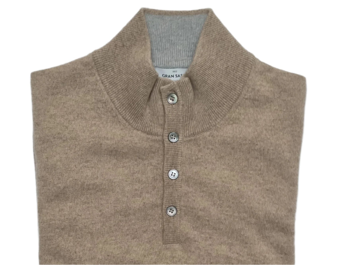 Experience style and comfort with the Gran Sasso 1/2 Zip Sweater. Made from premium materials, this versatile knitwear offers a refined half-zip design, perfect for both casual and smart occasions.