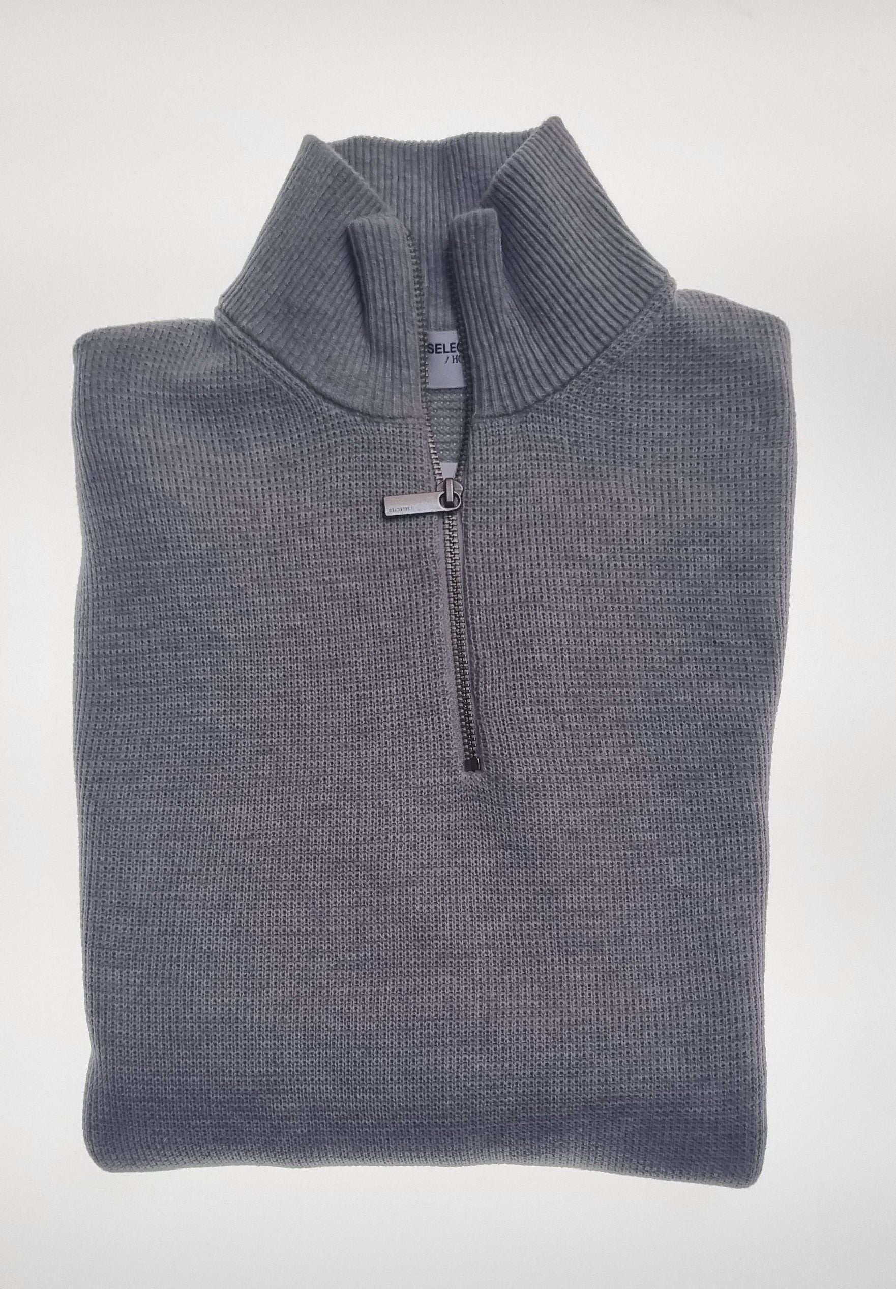 Selected Dane Half Zip jumper combines refined style with functional design. Perfect for layering or standalone wear, this knitwear essential offers a polished yet relaxed look. With its sleek half-zip detail and versatile fit, it’s ideal for casual and smart-casual occasions alike.