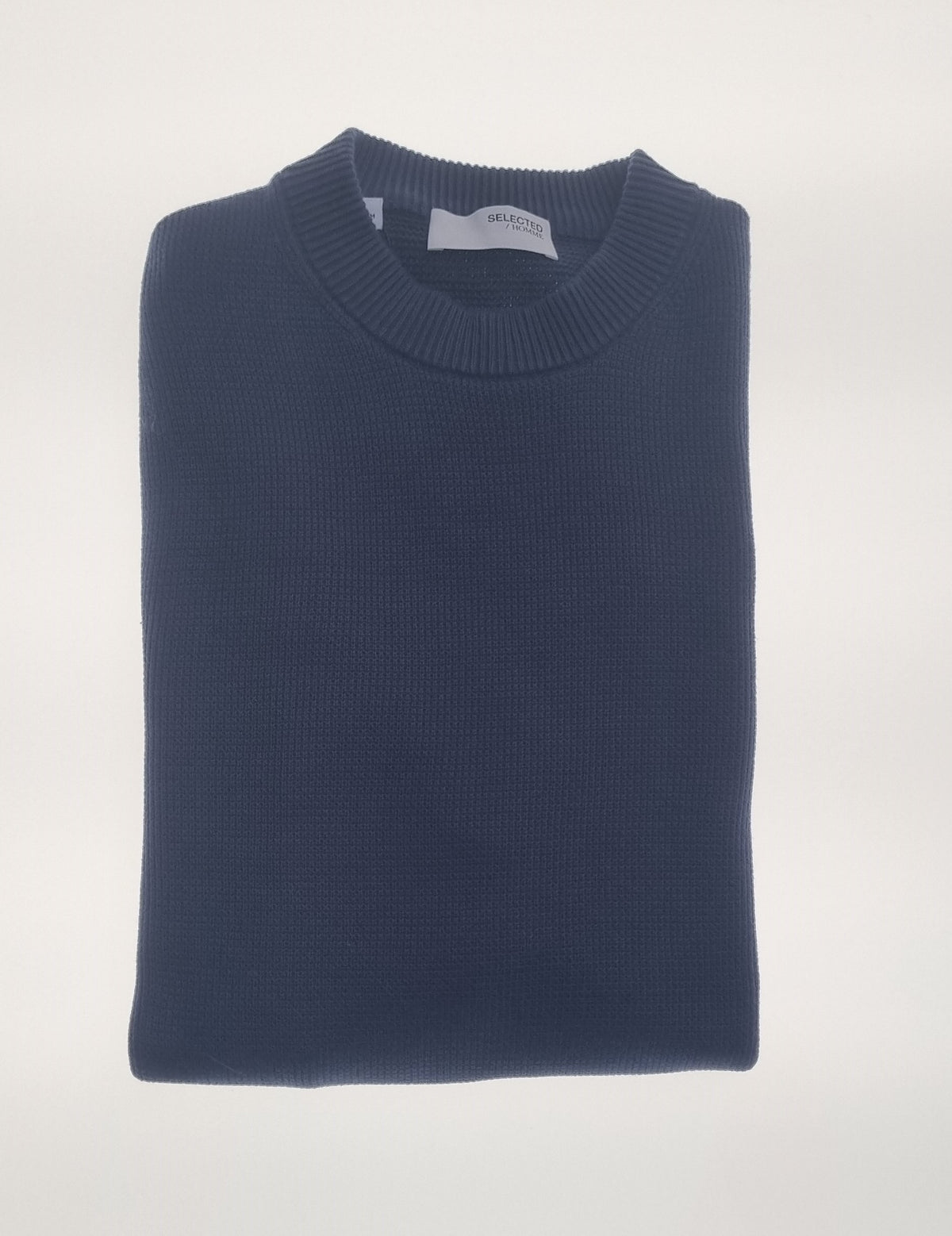 Selected Dane Crew Neck Jumper is the epitome of effortless sophistication. With its clean, classic crew neck design and premium knit texture, this jumper is a wardrobe essential for men who value style and comfort. Its timeless look ensures it complements both casual and smart outfits.