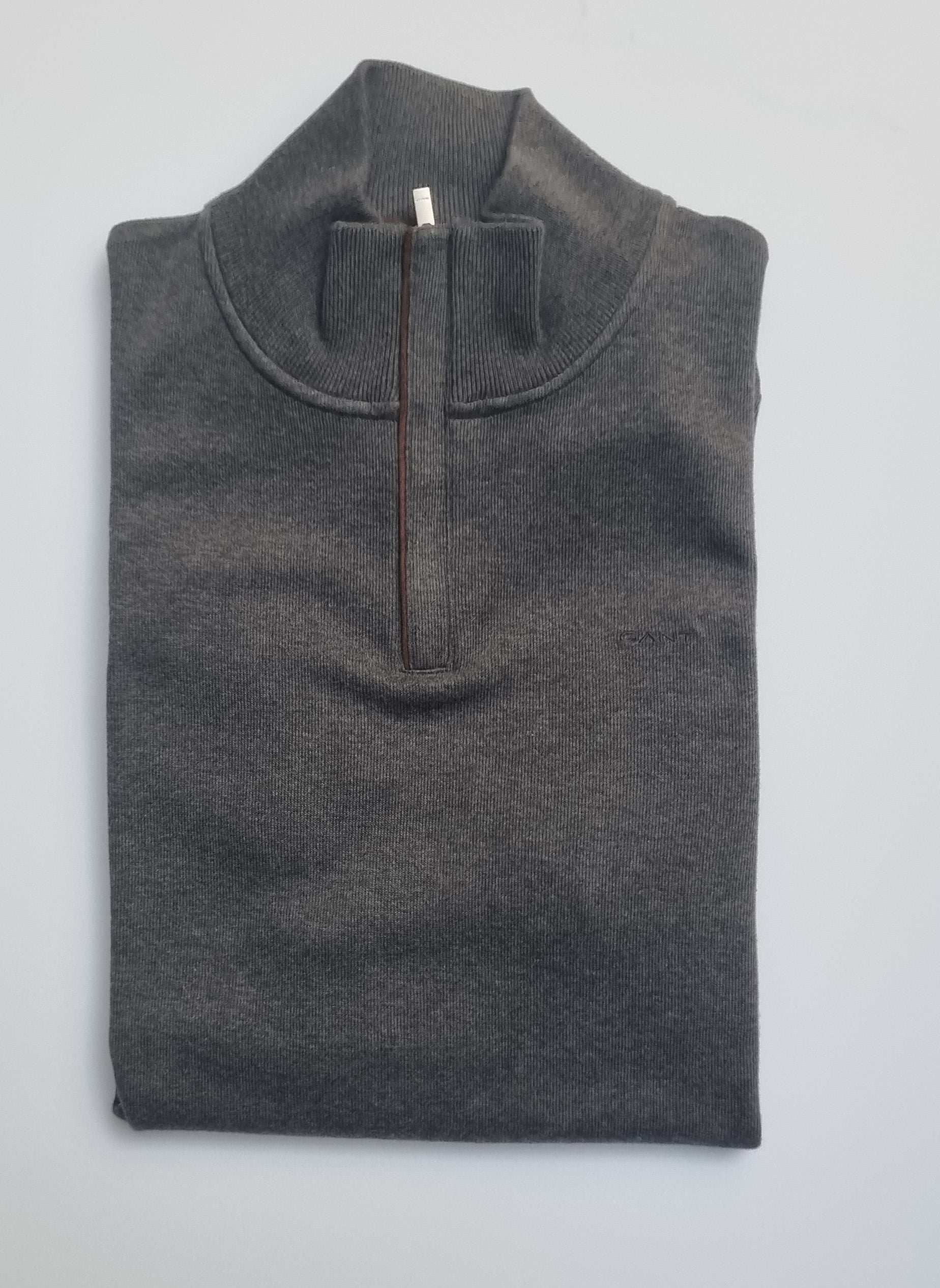 Dressier than a sweatshirt but just as comfortable, this piece is perfect for layering over shirts at the office or over T-shirts on the weekend.