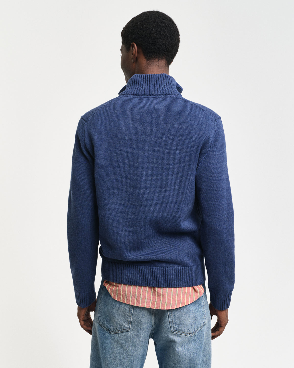 Crafted in medium-weight cotton and cut in a regular fit, this half-zip sweater features a GANT shield graphic embroidered at the chest. A perfect layer for style and warmth, pair this sweater with denim and tailored pants alike.