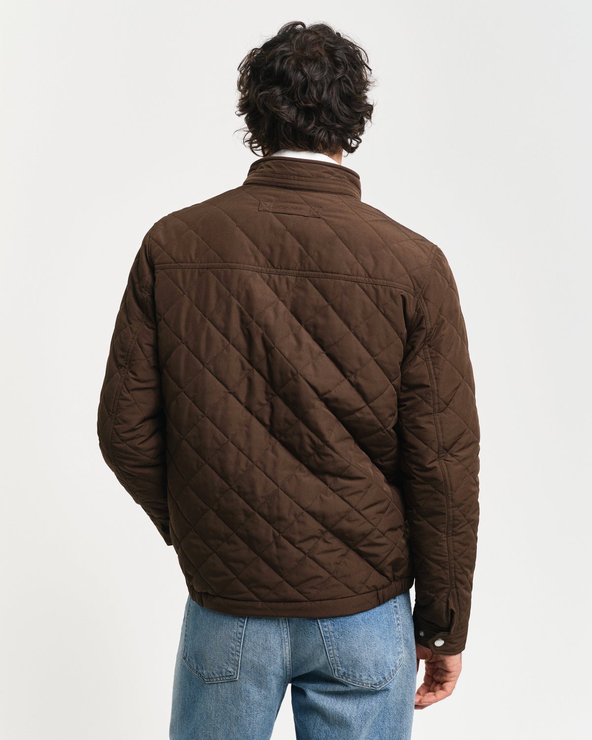 Crafted in a diamond quilting structure, this Quilted Windcheater Jacket features recycled polyester padding and is treated with a water-repellent finish. Design details include a one-way zipper at the front, snap buttons at the collar, slanted welt side pockets and an elasticated hem and cuff with a press button adjuster.