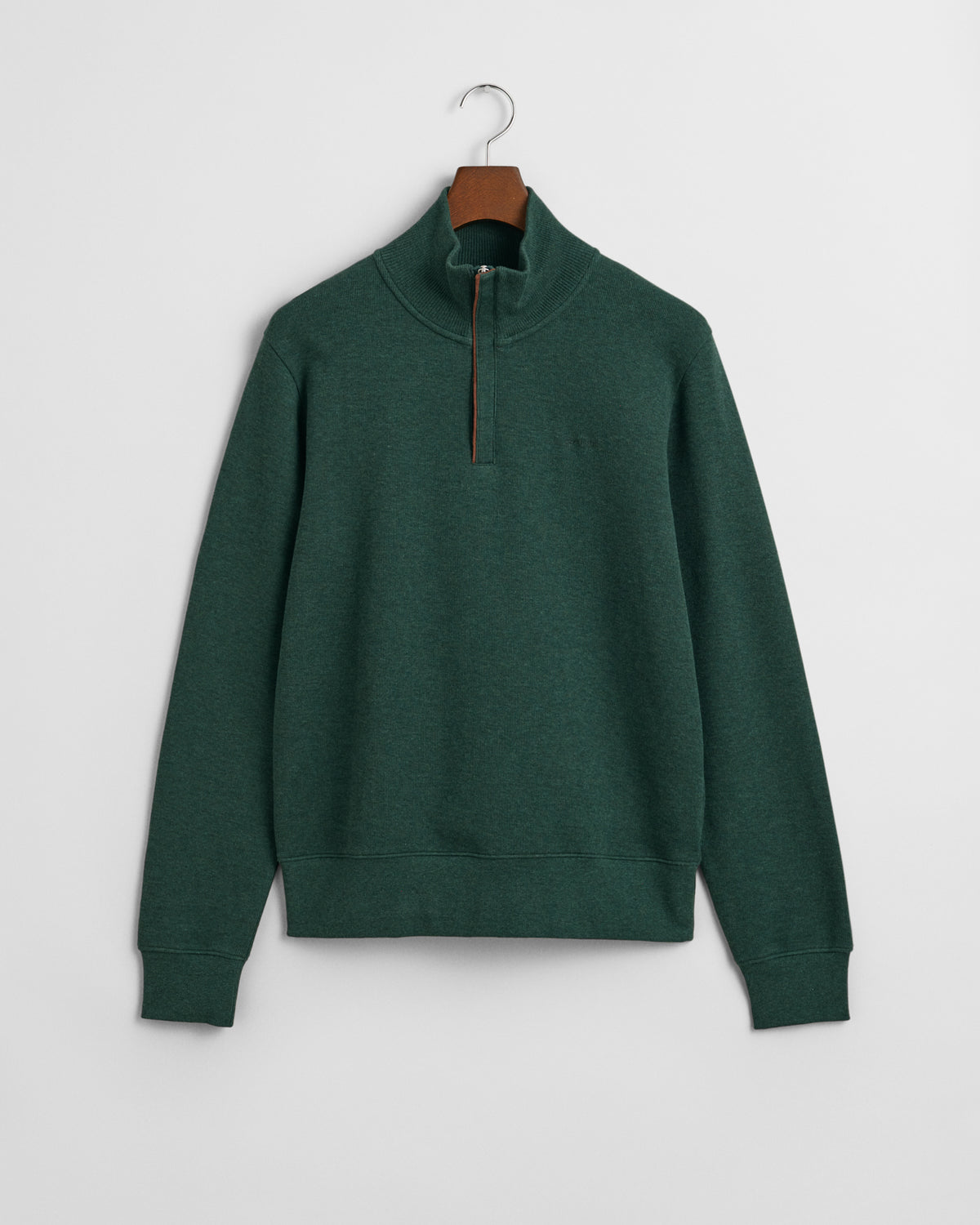 Dressier than a sweatshirt but just as comfortable, this piece is perfect for layering over shirts at the office or over T-shirts on the weekend.