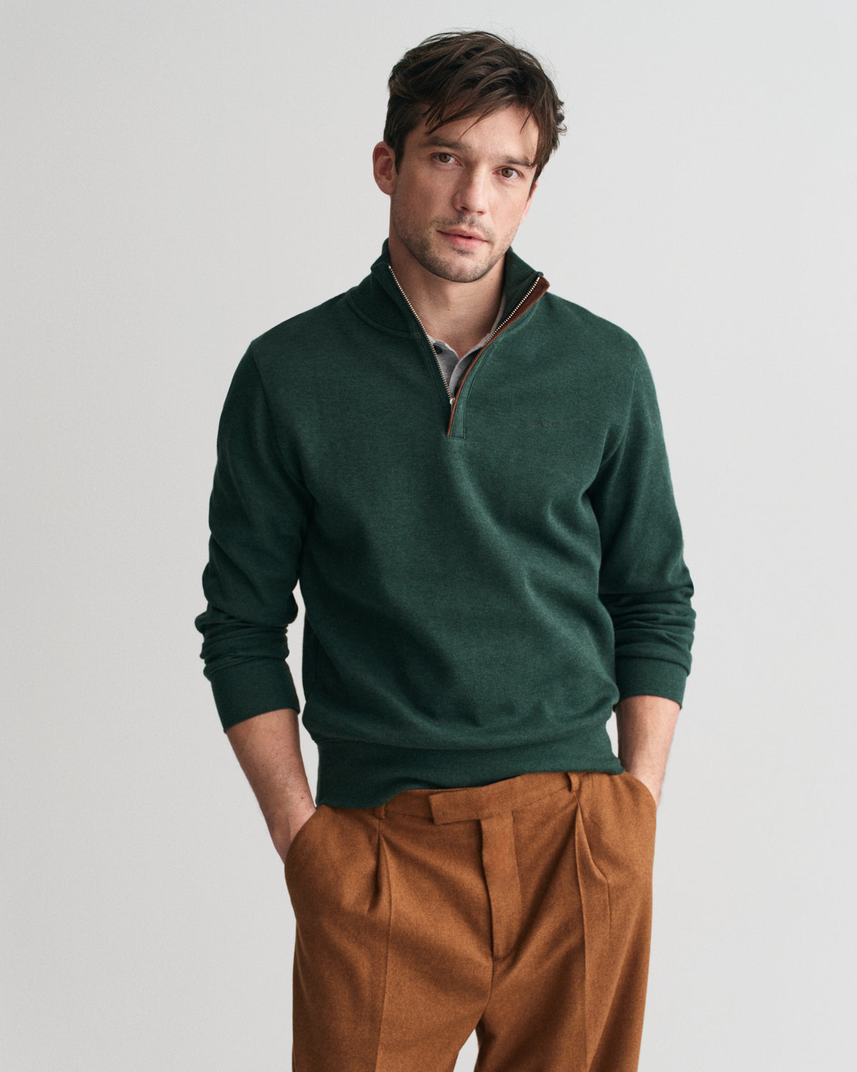 Dressier than a sweatshirt but just as comfortable, this piece is perfect for layering over shirts at the office or over T-shirts on the weekend.