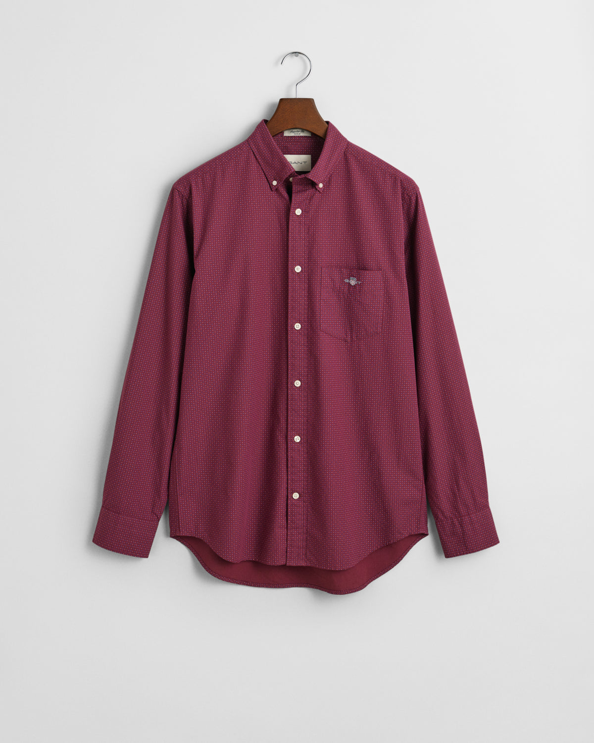  the Gant Micro Print Shirt, a stylish option for both casual and smart-casual occasions. This shirt features a subtle micro print pattern that adds a modern touch to its classic design. 