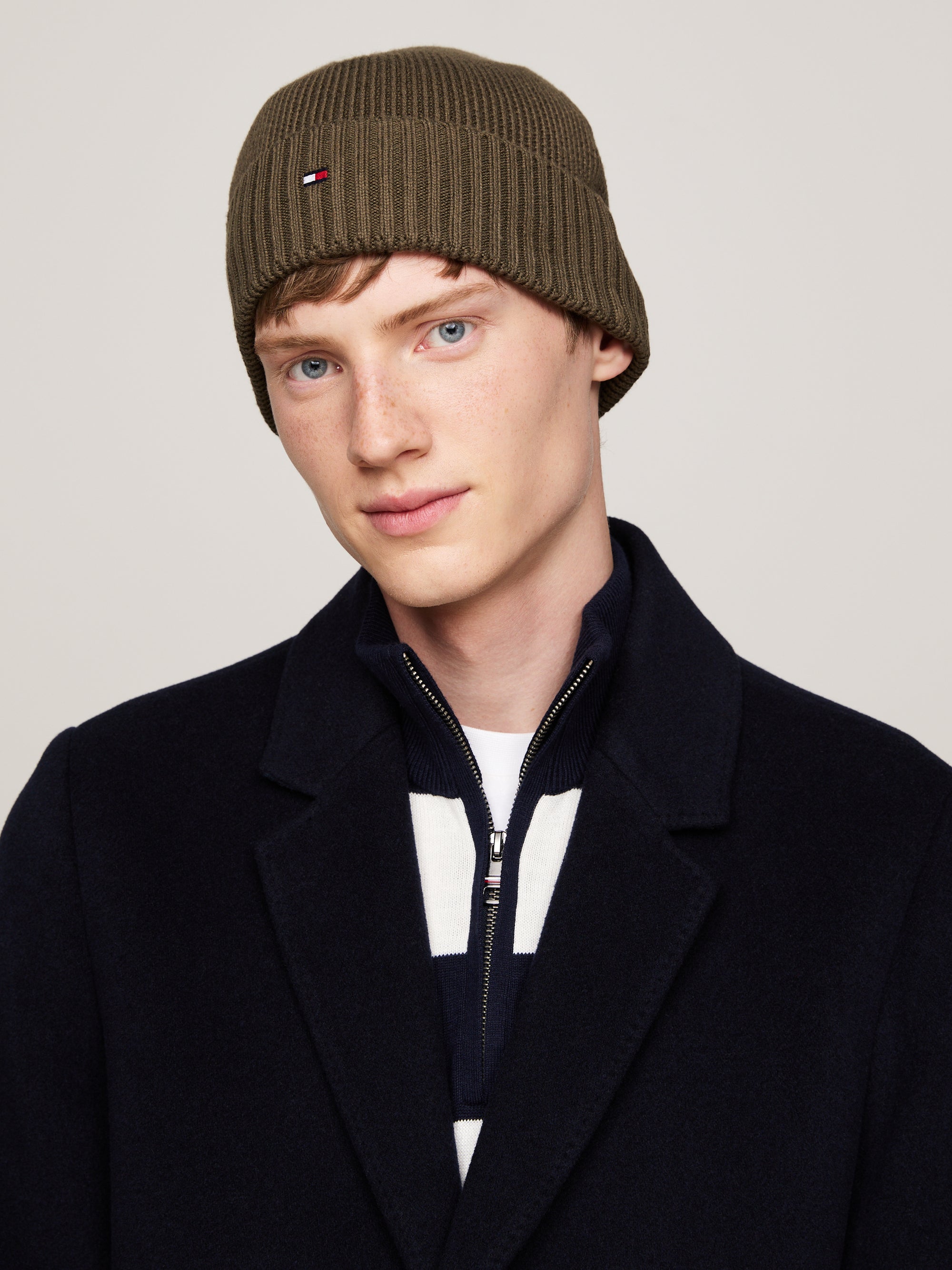 Tommy Hilfiger Flag Pima Beanie. Made from soft pima cotton, this beanie offers comfort and iconic style with its signature flag logo.