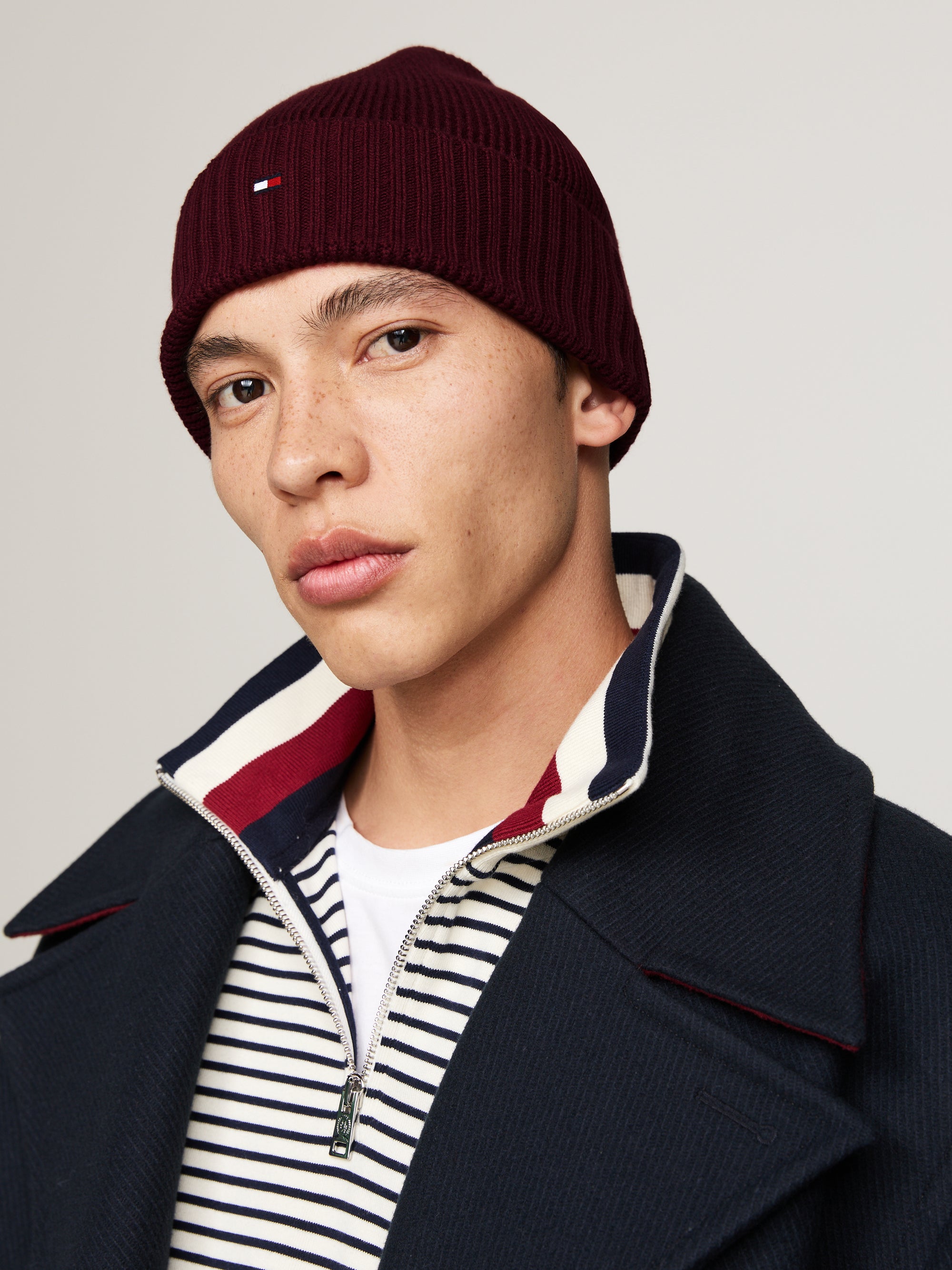 Tommy Hilfiger Flag Pima Beanie. Made from soft pima cotton, this beanie offers comfort and iconic style with its signature flag logo.