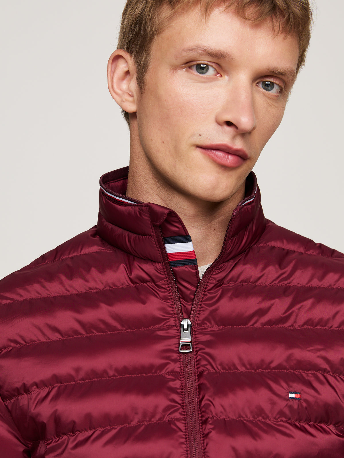 Tommy Hilfiger - Core packable circular jacket ,Featuring a camo print for utilitarian vibes, this packable padded jacket is water-repellent and has warming thermal properties.