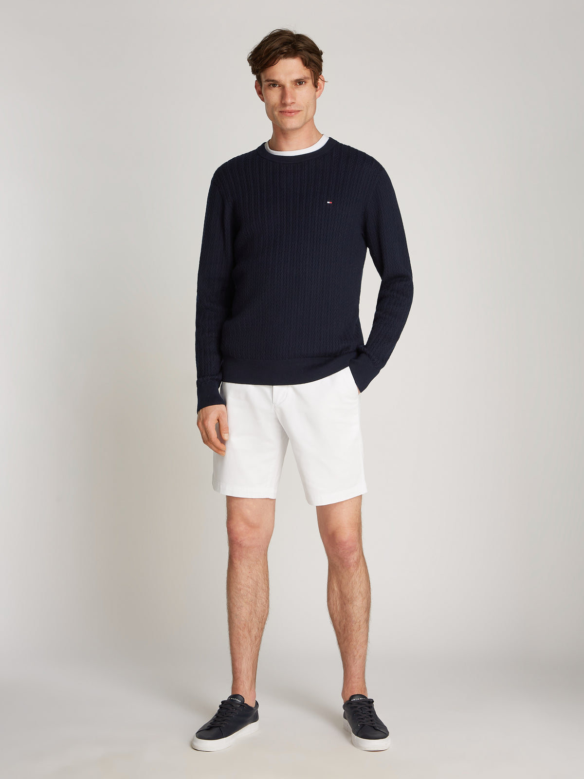 Tommy Hilfiger Herringbone Structure Crew Neck Jumper. Crafted from soft, premium fabric, this jumper features a sophisticated herringbone pattern that adds texture and depth to any casual or smart-casual outfit.