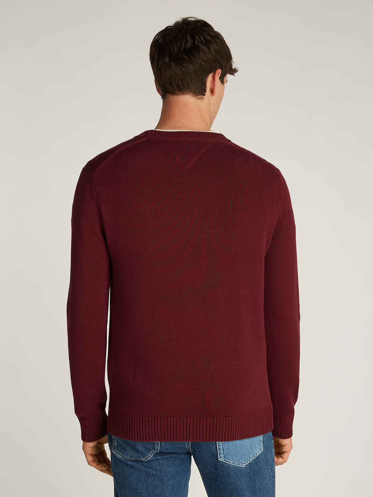 Tommy Jeans Essential Crew Sweater. Crafted from soft cotton, this versatile crew neck jumper is perfect for everyday wear