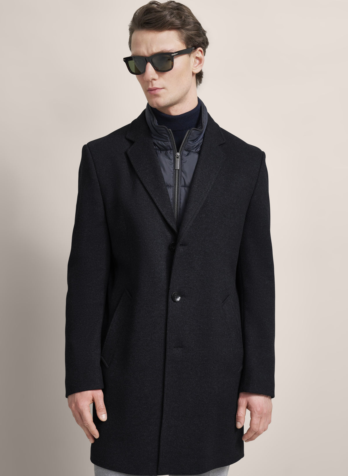 Bugatti Wool Overcoat is a luxurious blend of warmth and sophistication, perfect for elevating your outerwear collection. Constructed from premium wool, this overcoat provides comfort and insulation