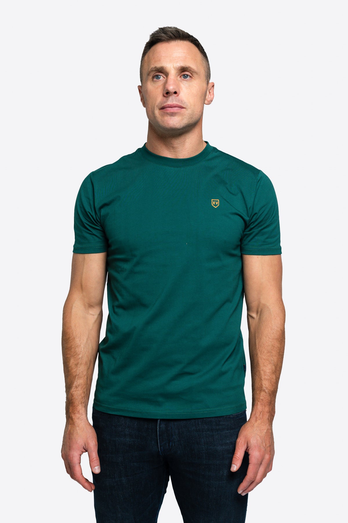  XV Kings Golden Eagles Tee is a stylish and comfortable staple, perfect for casual wear. Crafted from premium fabric, this short sleeve crew neck t-shirt offers a soft and breathable feel, ideal for all-day comfort. Featuring modern branding and a sleek fit, this tee pairs effortlessly with jeans, chinos, or shorts, making it a versatile addition to your wardrobe.